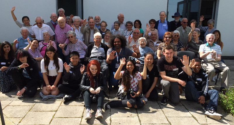 Group photo of Dementia Club UK and the team from NCS with Ancell sitting in the centre